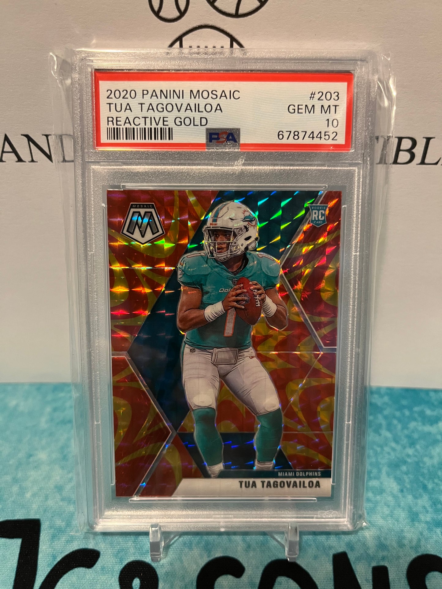 2020 Panini Mosaic Tua Tagovailoa Reactive Gold Prizm PSA 10